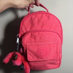 Kipling convertible mini backpack in Pink